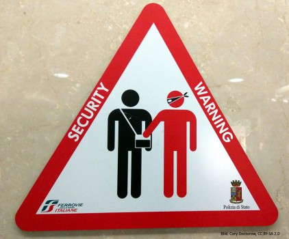 Warnung vor Taschendieben der italienischen Polizei (Bild: Cory Doctorow, CC BY-SA 2.0)