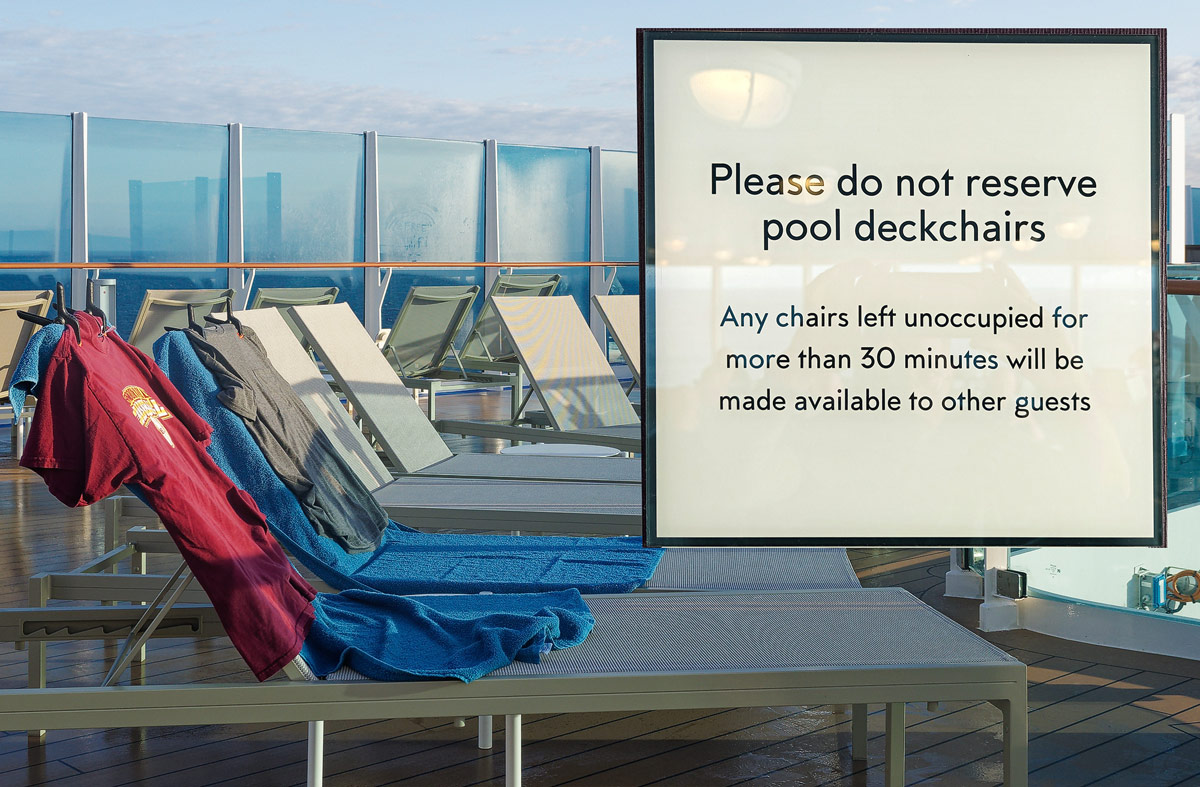 Symbolbild: Reservieren von Sonnenliegen